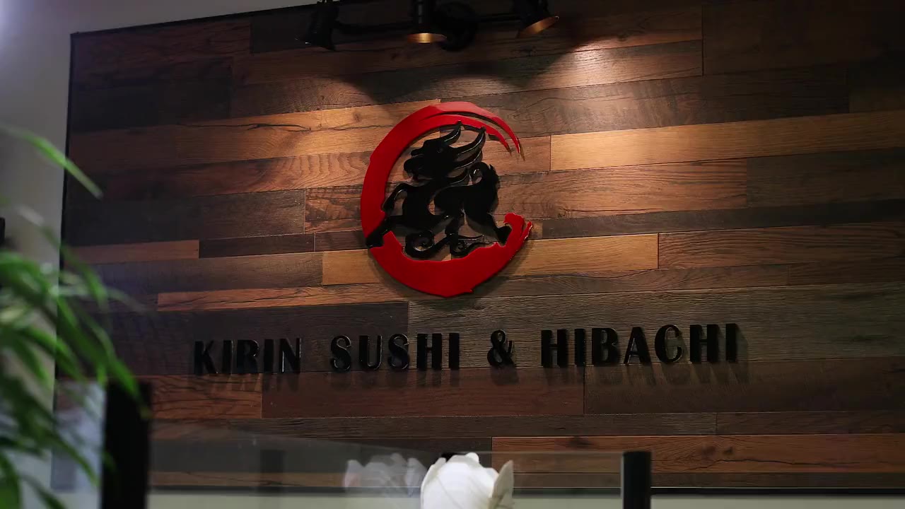 Inside Kirin Sushi & Hibachi, from the warm walnut dining room to the sizzling grill